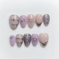 y2k purple chrome short almond press on nails with spiral motifs and chrome hearts
