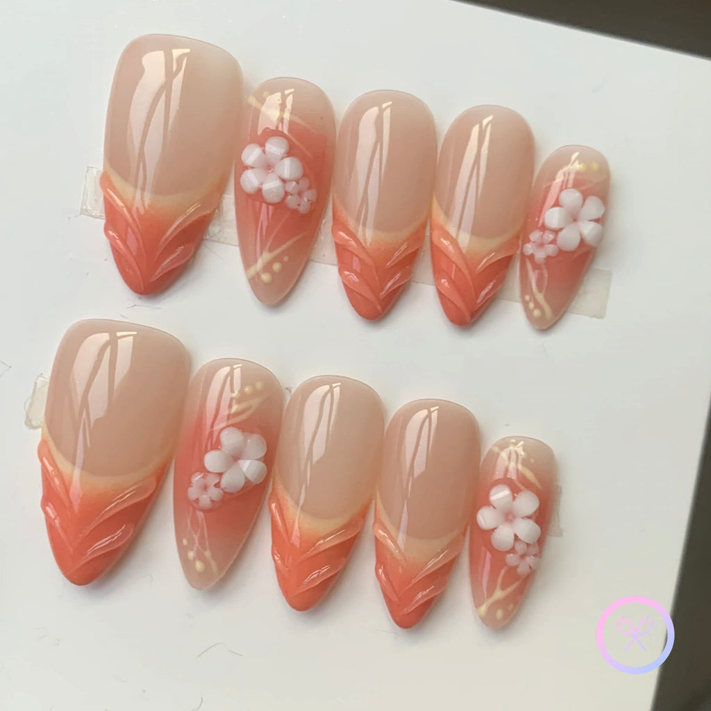 romantic orange glossy medium press on nails with swirls and embossed flowers