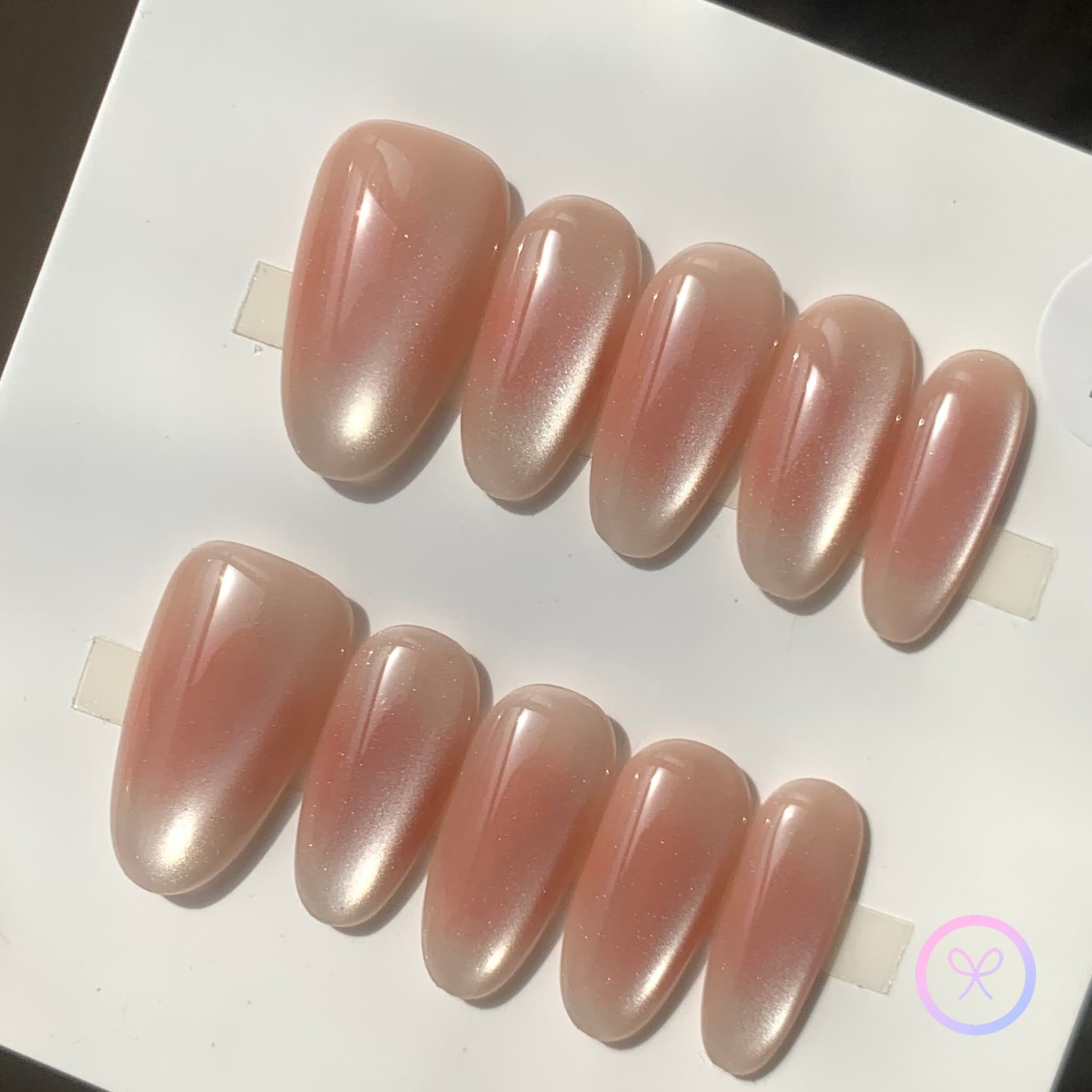 minimalist nude glossy medium oval press on nails, cat eye set