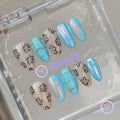 natural cyan glossy short almond press on nails with daisy and lattice