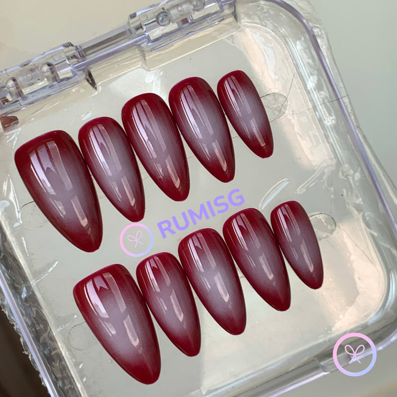minimalist red glossy medium almond press on nails with dark red gradient