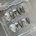 goth black chrome thorn short almond press on nails with star