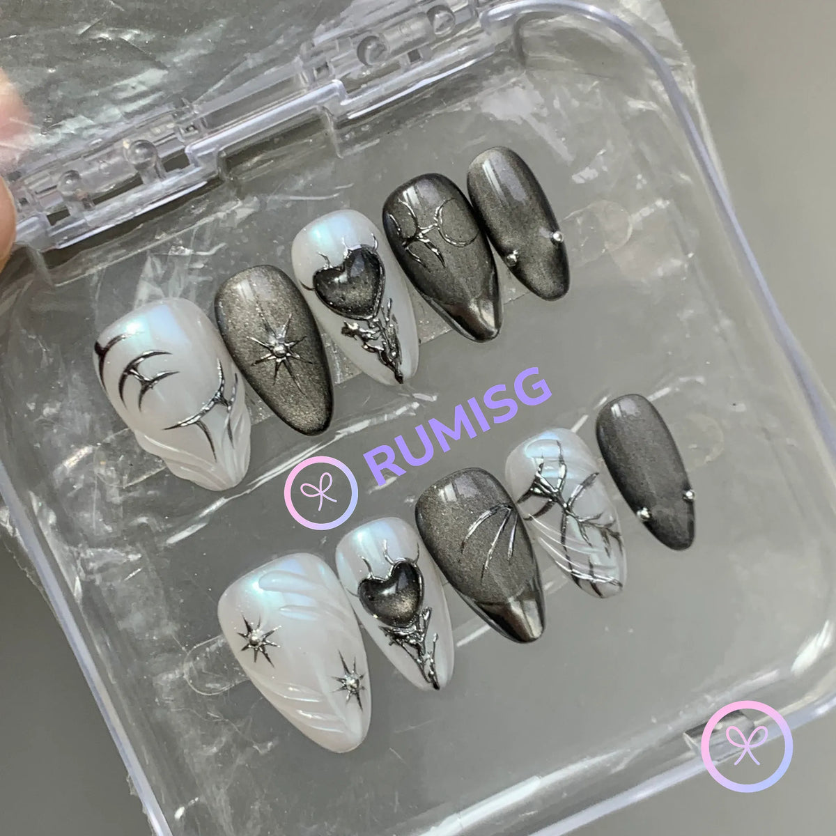goth black chrome thorn short almond press on nails with star