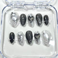 gothic black chrome short almond press on nails with swirls and black hearts