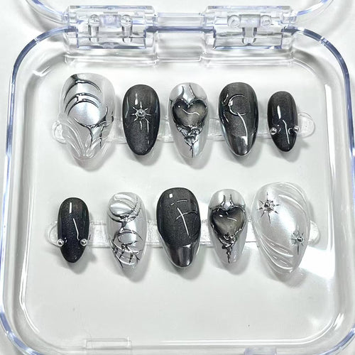 gothic black chrome short almond press on nails with swirls and black hearts