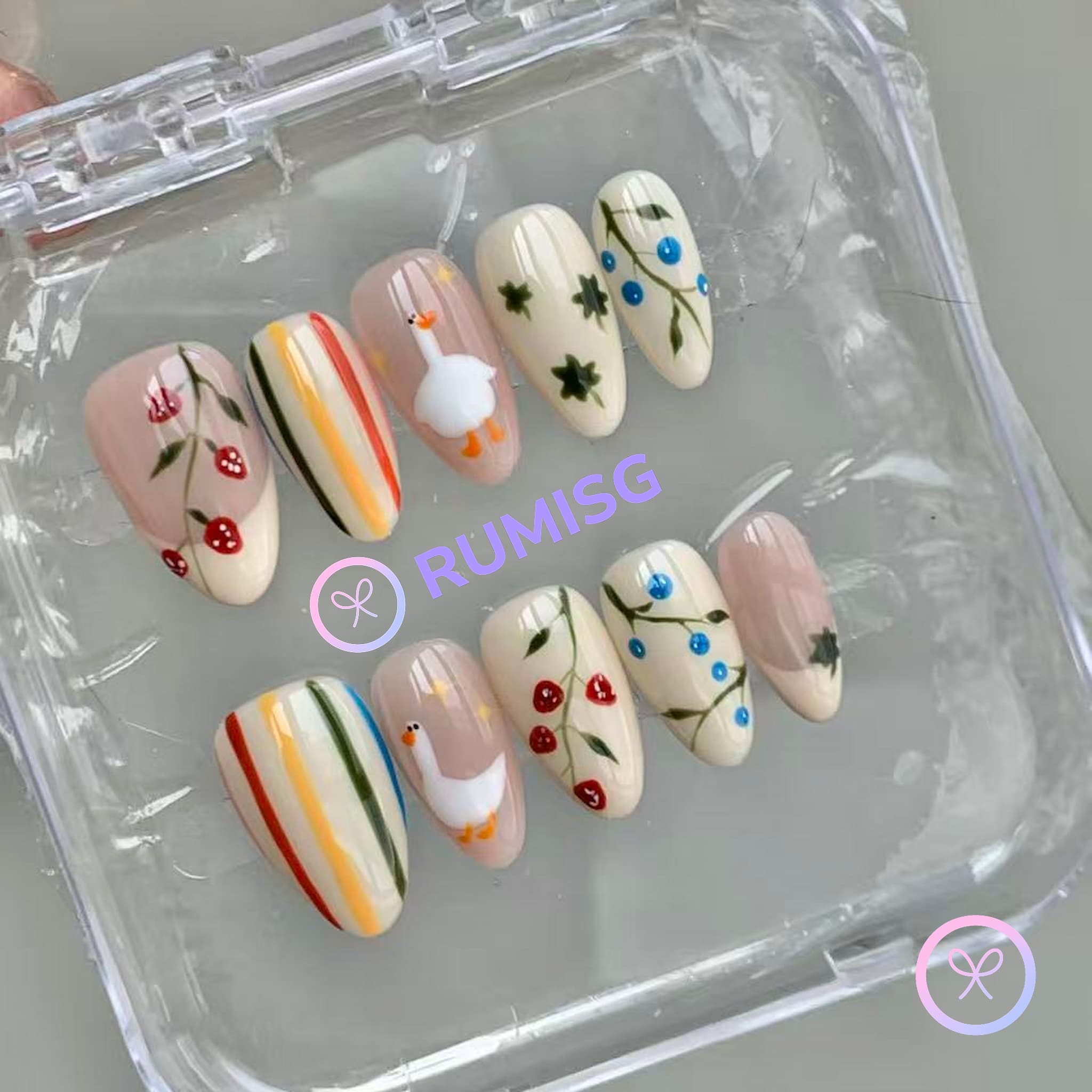 cottagecore white glossy short almond press on nails with duck and strawberry motifs