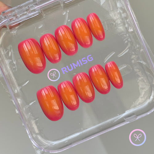 minimalist orange glossy short oval press on nails with red orange gradient
