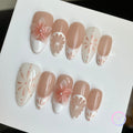 elegant nude glossy medium press on nails with cirtus and embossed flowers