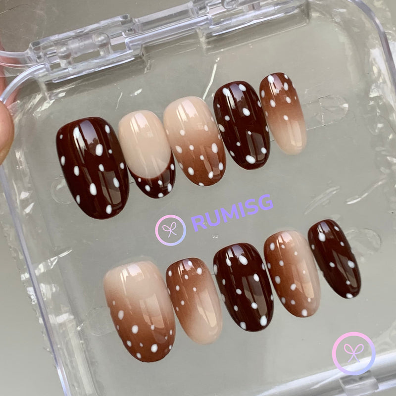 animal print brown glossy short oval press on nails with fawn print and nude gradient