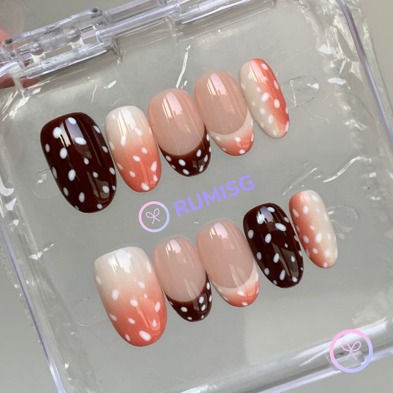 animal print coral glossy short oval press on nails with fawn print and coral gradient