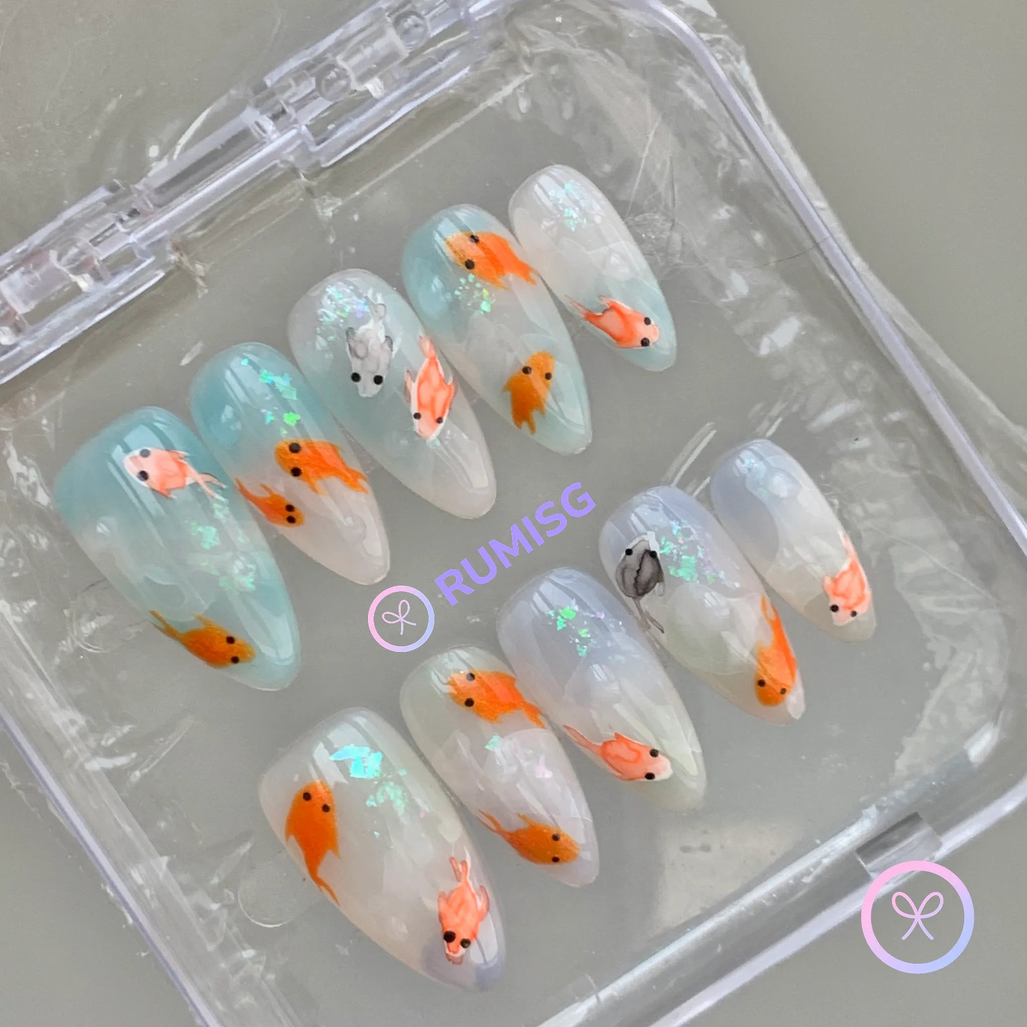 natural cyan glossy medium almond press on nails with koi fish and holographic flake