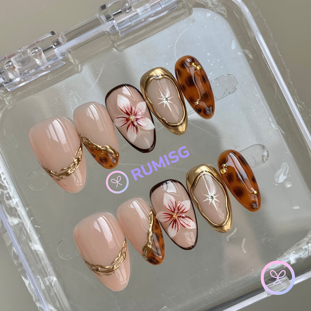 animal print nude glossy short almond press on nails with 3d flower and tortoiseshell