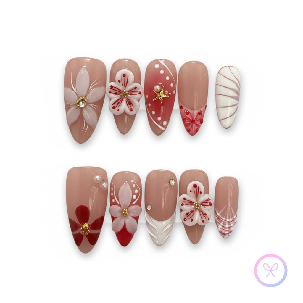 romantic nude glossy medium almond press on nails with 3d flower motifs and summer aesthetic