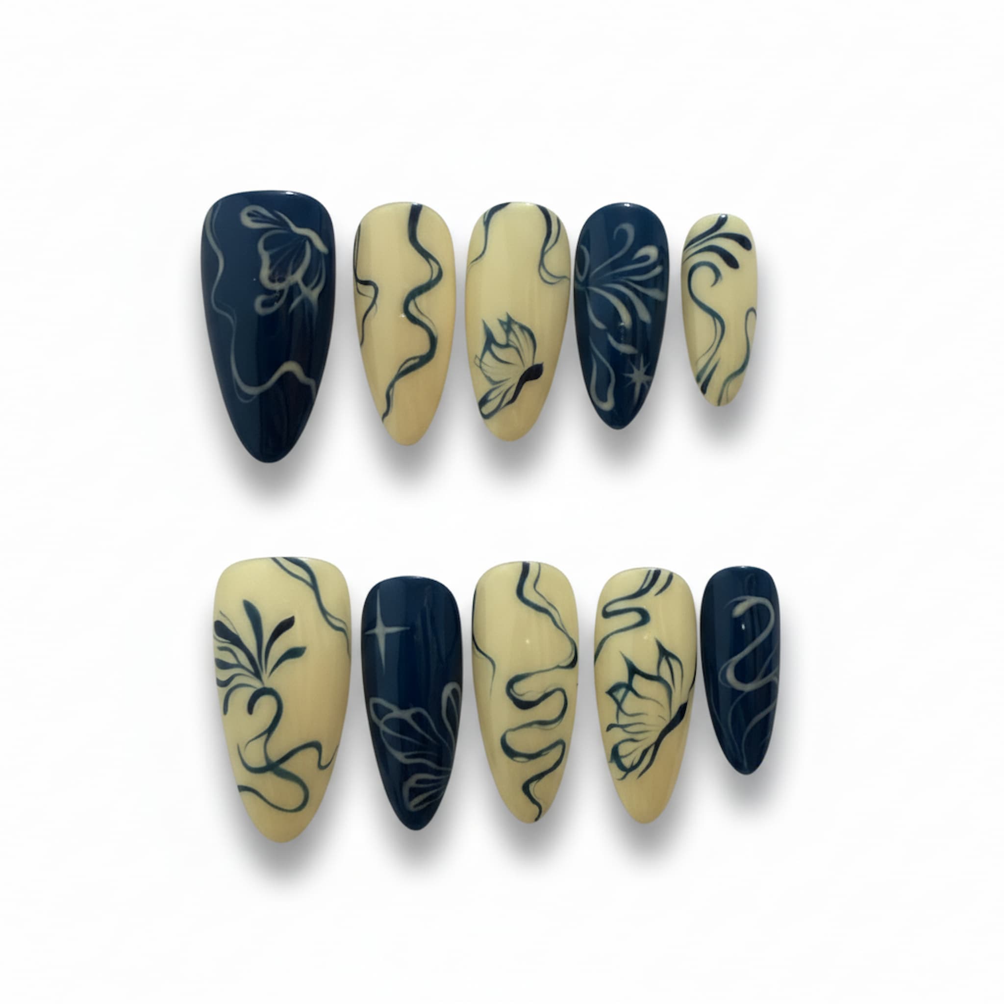 abstract blue glossy medium almond press on nails with butterfly motif and swirls