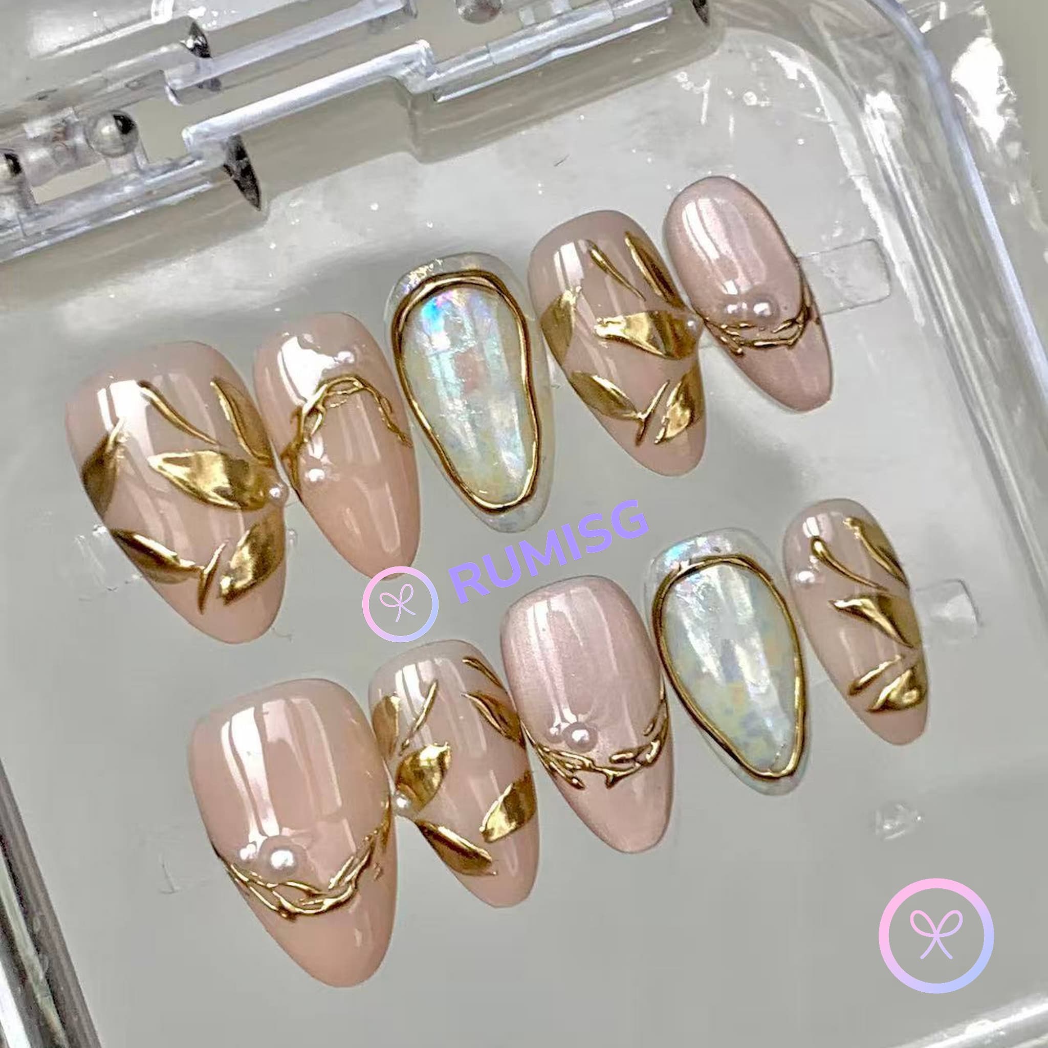 elegant nude glossy short almond press on nails with ginkgo leaf and gold filigree