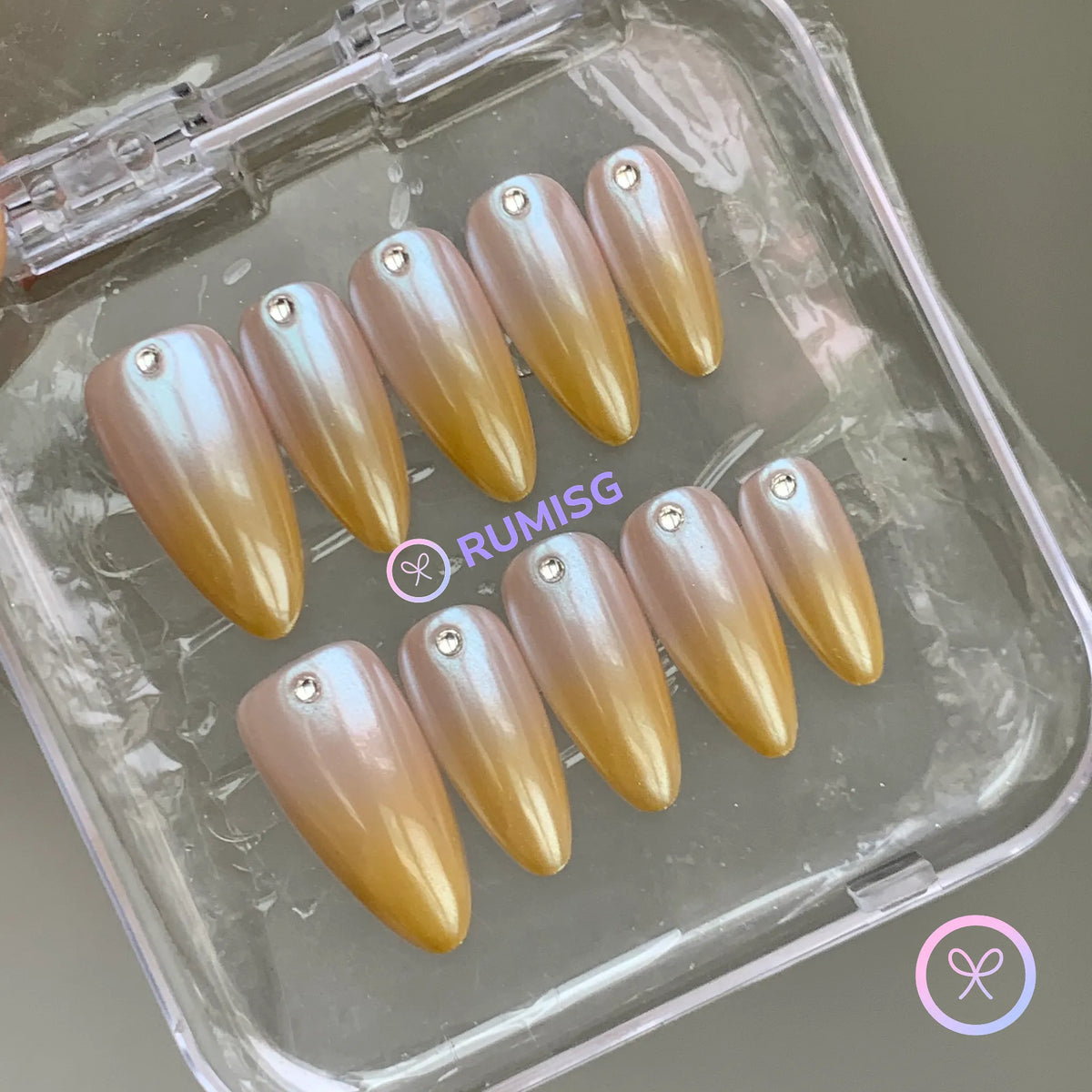 minimalist gold glossy ombre medium almond press on nails with rhinestone
