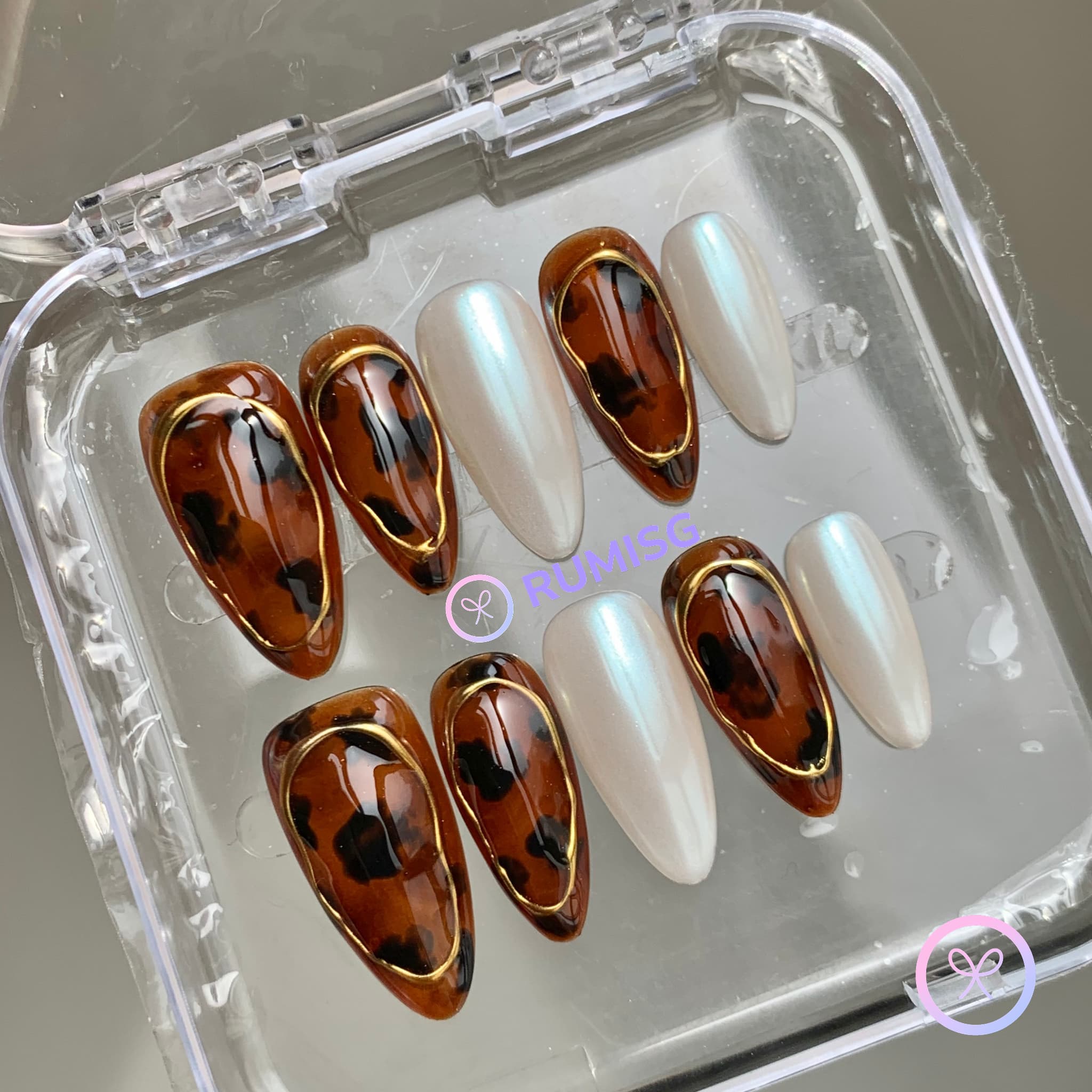 animal print brown glossy medium almond press on nails with contours