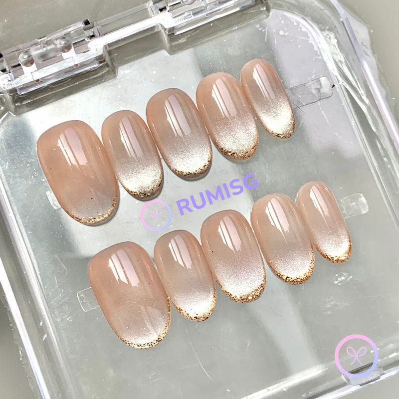 elegant nude glossy short oval press on nails with gold glitter french tip