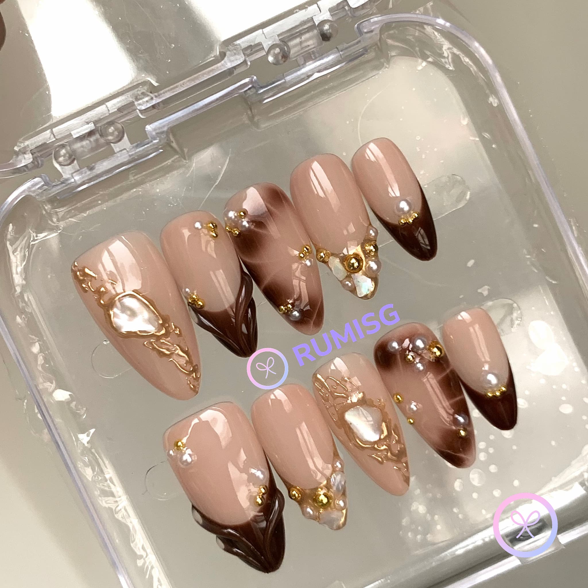 elegant brown glossy medium almond press on nails with pearls and gold beads