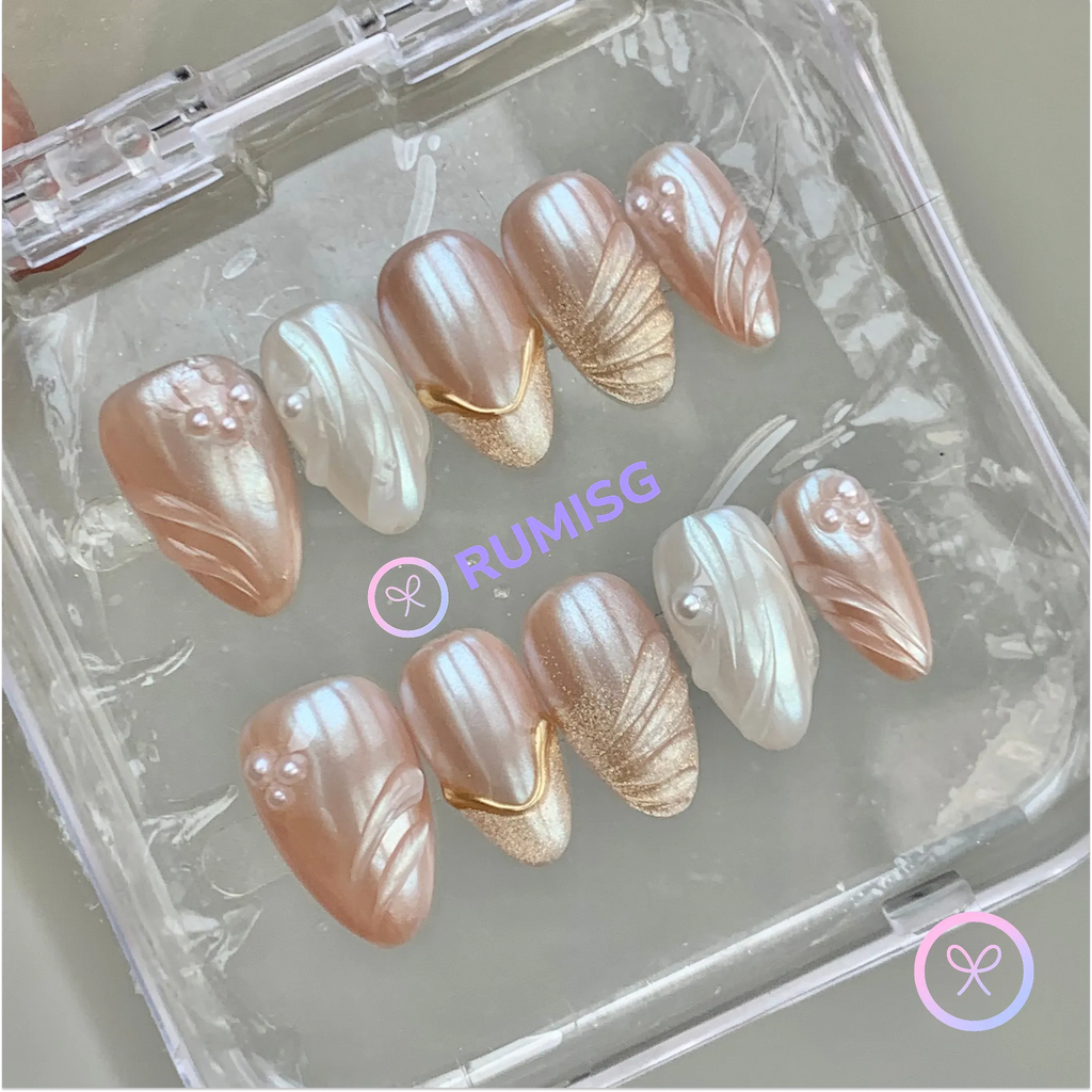 pearlcore nude pearlescent short almond press on nails with swirl and pearl
