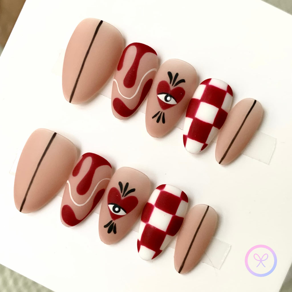 dark red matte short almond press on nails with checkerboard