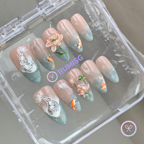 natural cyan glossy medium almond press on nails with koi fish and lotus flower