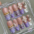 royalcore purple glossy long square press on nails with pearl and silver butterfly charm