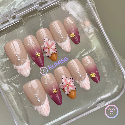 oceanic nude glossy medium almond press on nails with seashell charm and 3d flower