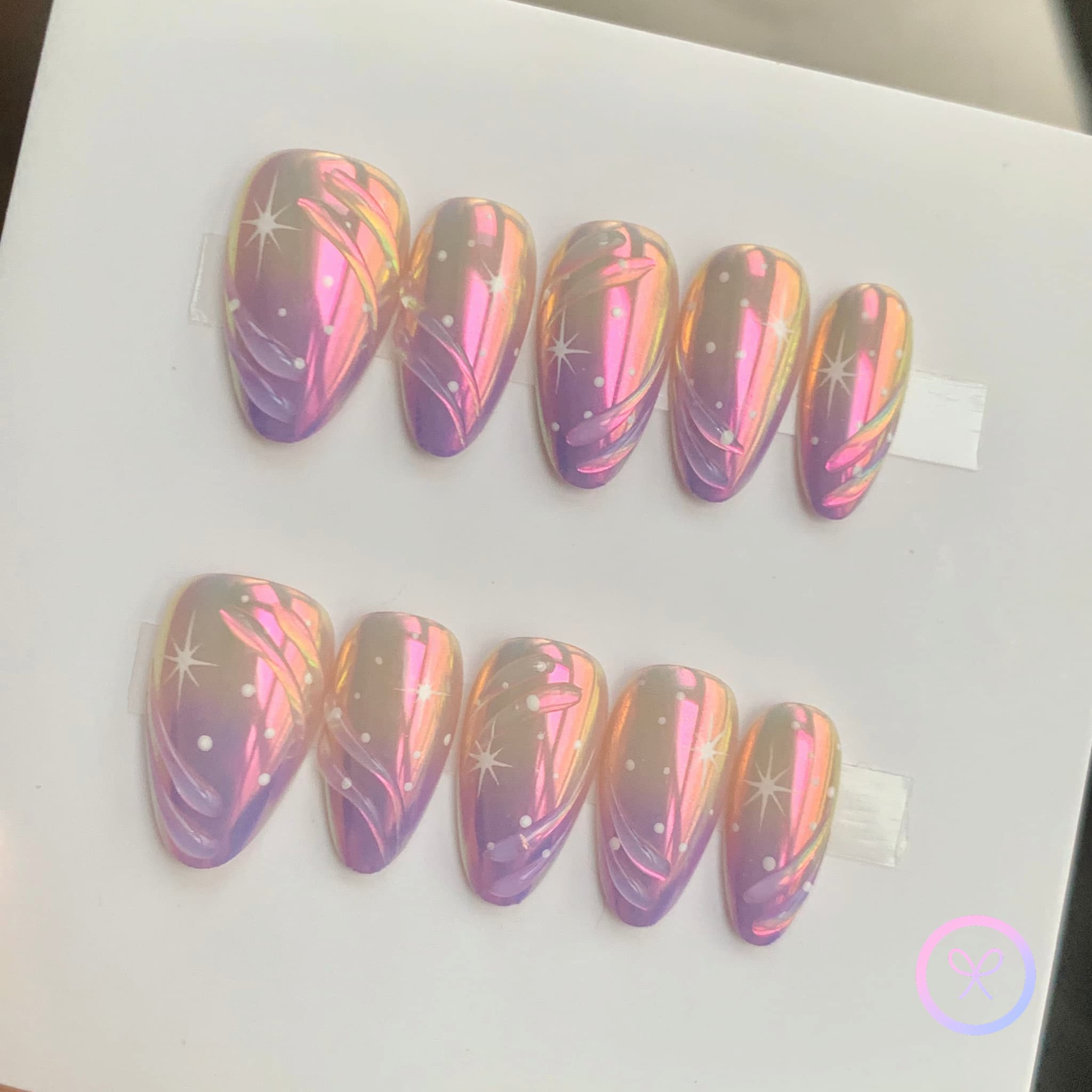 elegant purple iridescent medium almond press on nails with stars , swirls and dots