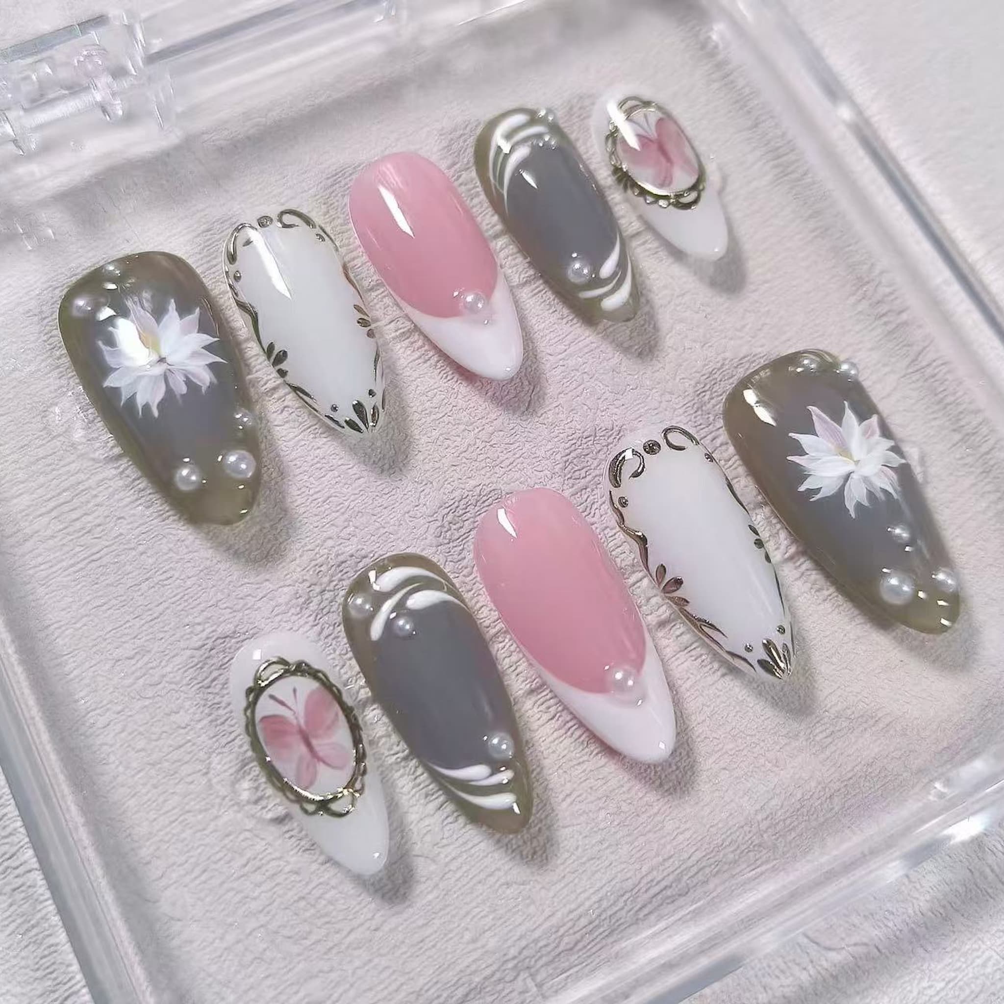elegant white glossy medium almond press on nails with lotus flower