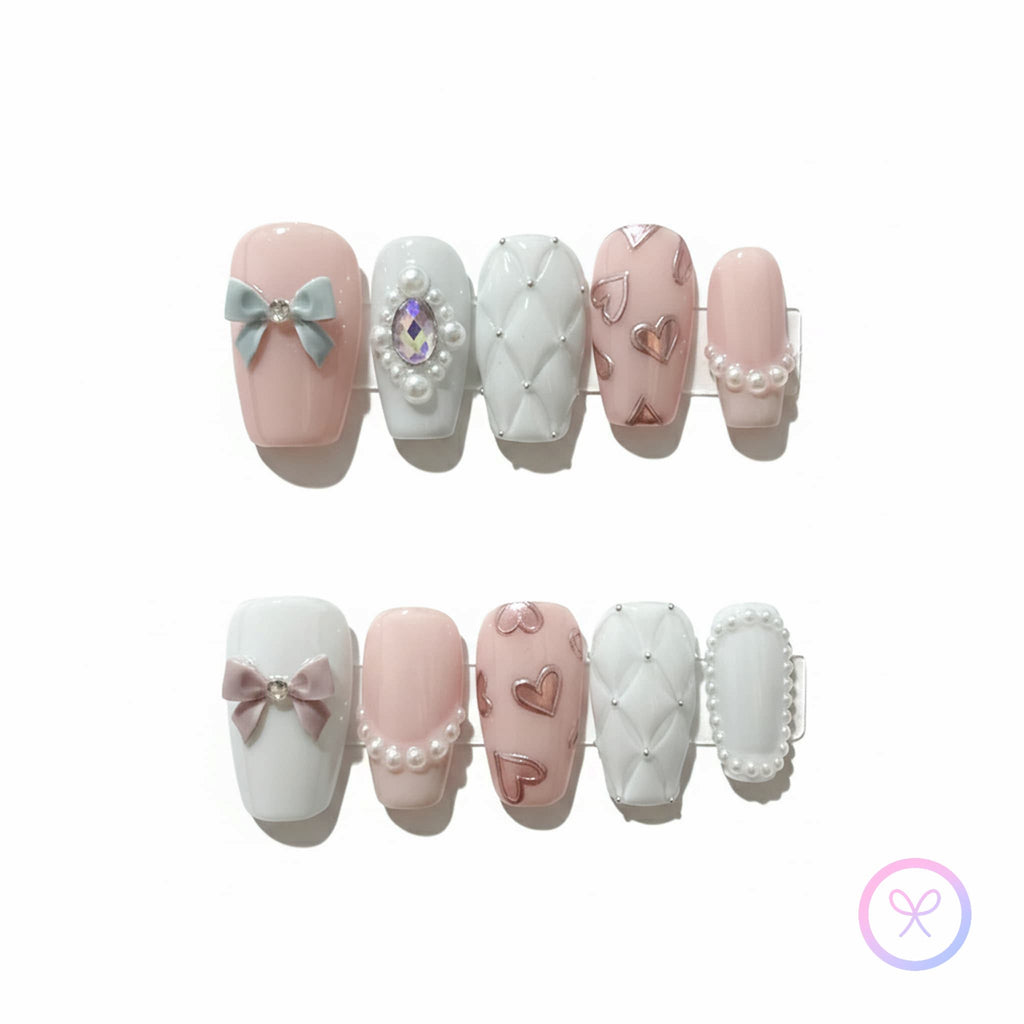 romantic pink glossy medium coffin press on nails with pearl linework and pearl frames and 3d bows