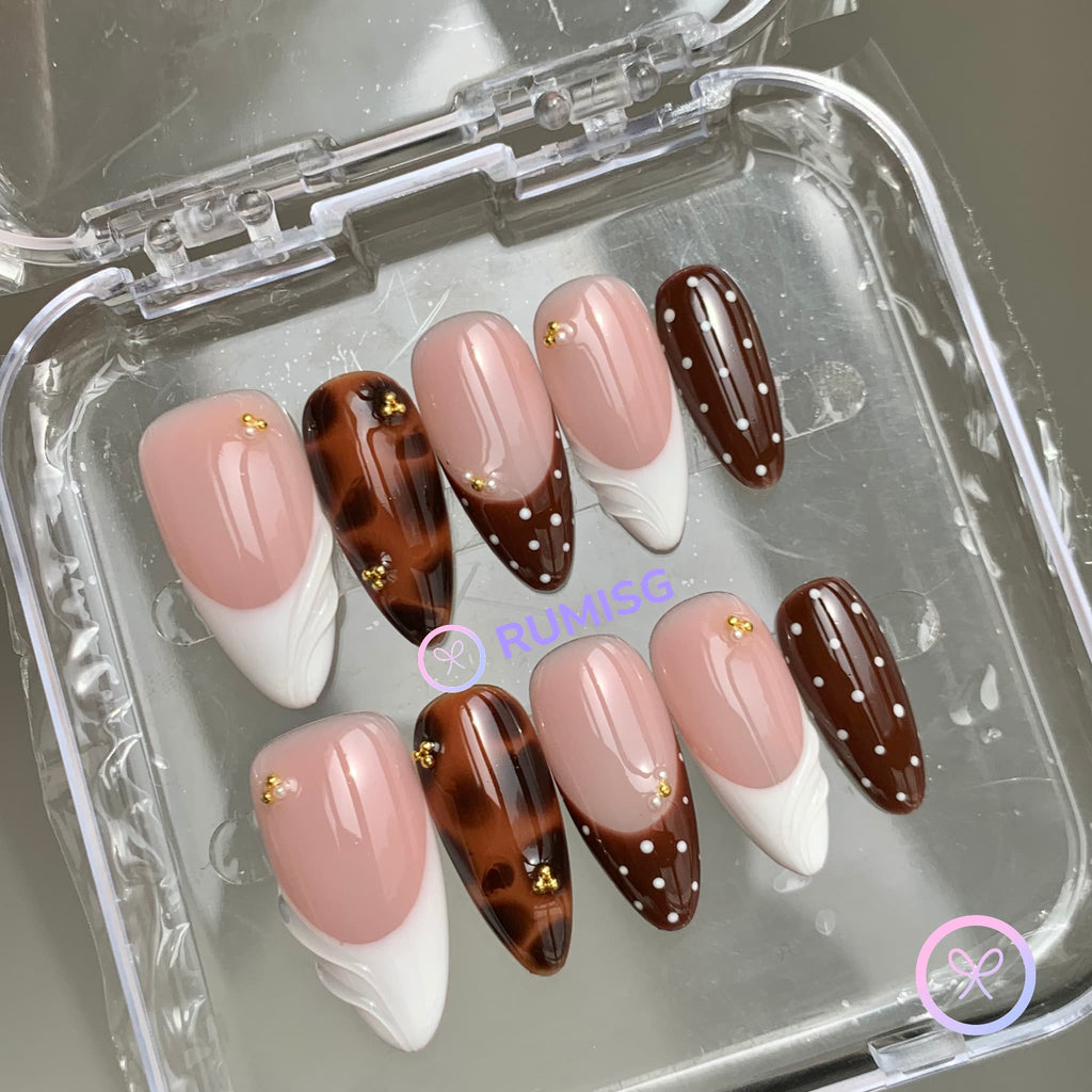 animal print nude glossy medium almond press on nails with tortoiseshell and gold beads
