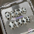 animal print white glossy short oval press on nails with black and white tortoiseshell