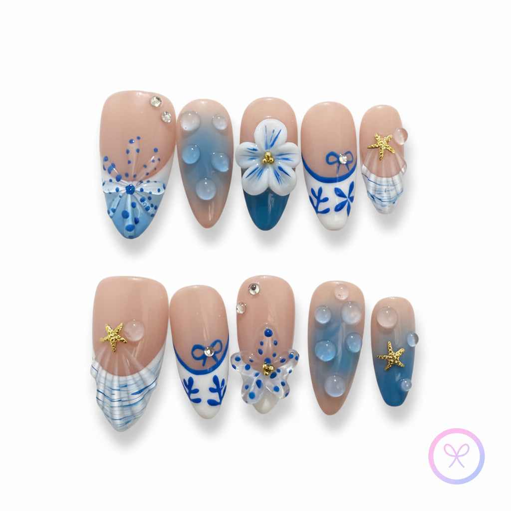 oceanic nude glossy medium almond press on nails with water droplets and 3D Flowers