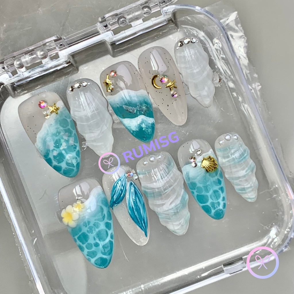 mermaidcore cyan glossy medium almond press on nails with mermaid tails