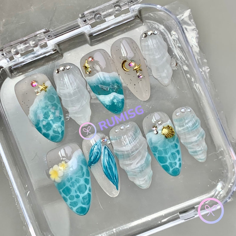 mermaidcore cyan glossy medium almond press on nails with mermaid tails