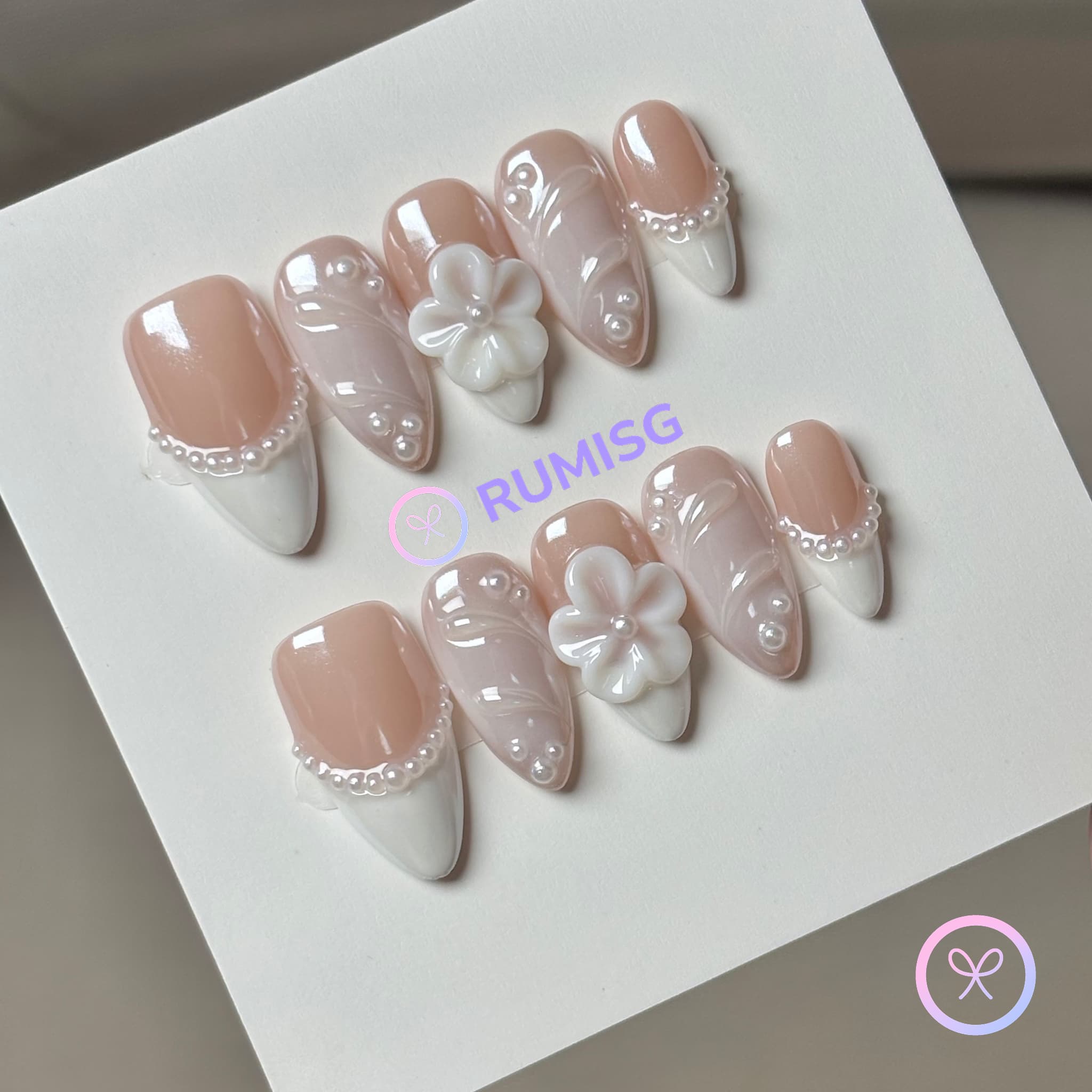 elegant white glossy short almond press on nails with pearl linework and 3d flowers