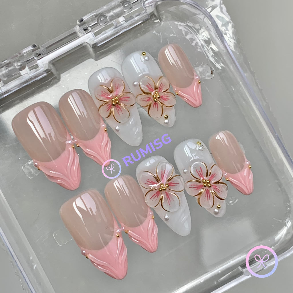 elegant nude glossy medium almond press on nails with embossed flower and pearls