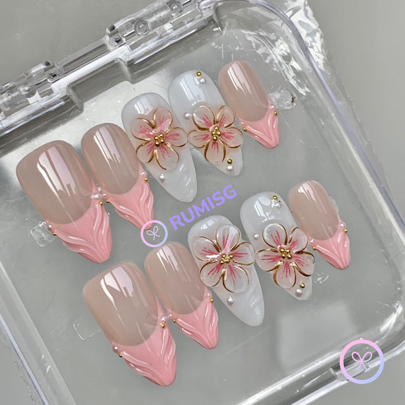 elegant nude glossy medium almond press on nails with embossed flower and pearls