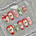 fruitcore red glossy short almond press on nails with apple cross section and plaid star detail