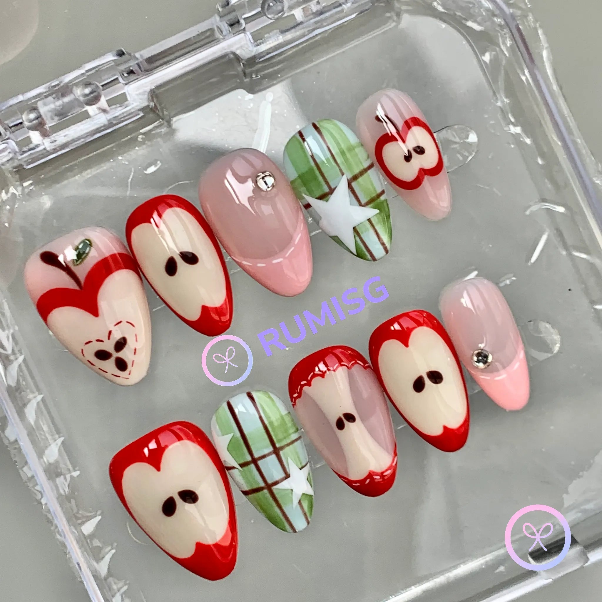 fruitcore red glossy short almond press on nails with apple cross section and plaid star detail