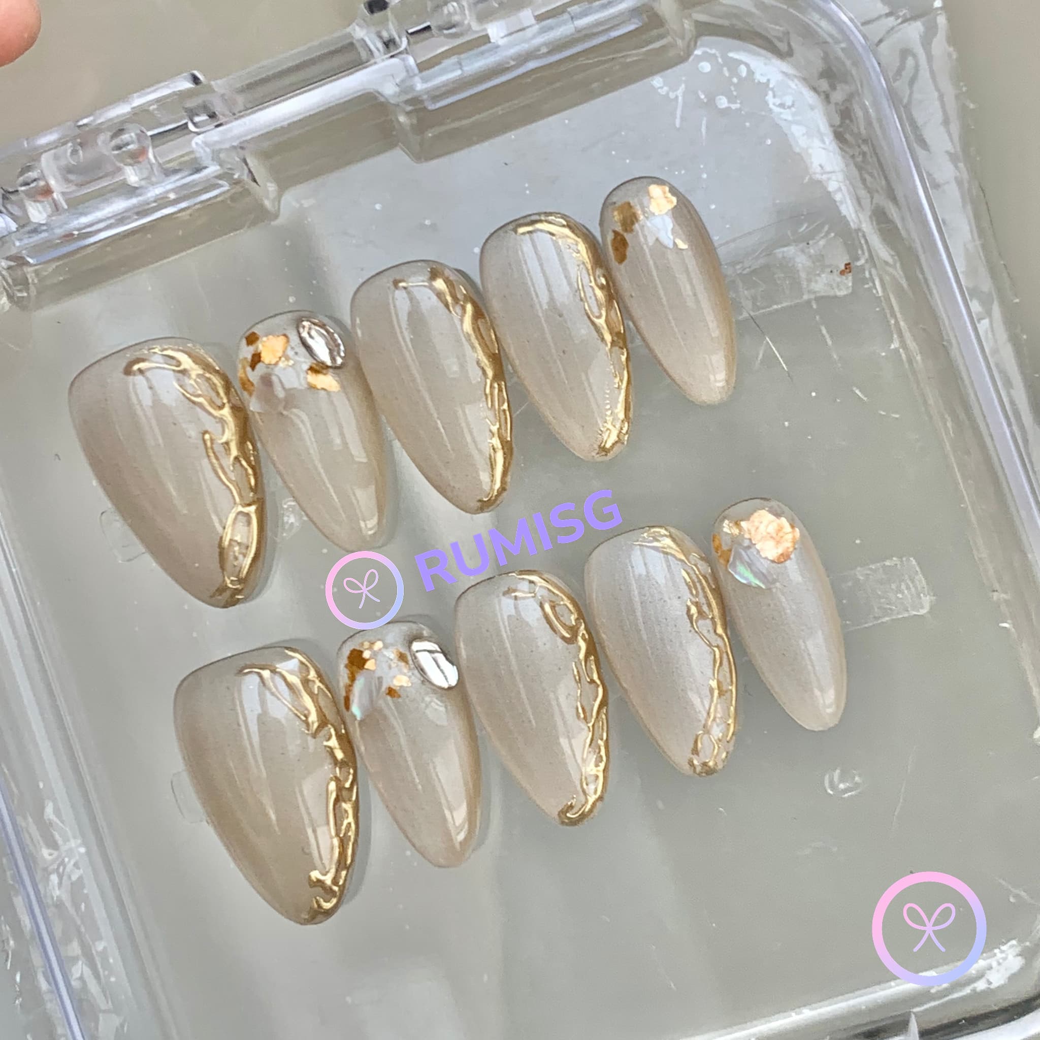 elegant nude glossy short almond press on nails with filigree