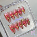 elegant pink glossy medium almond press on nails with gold contour and gradient