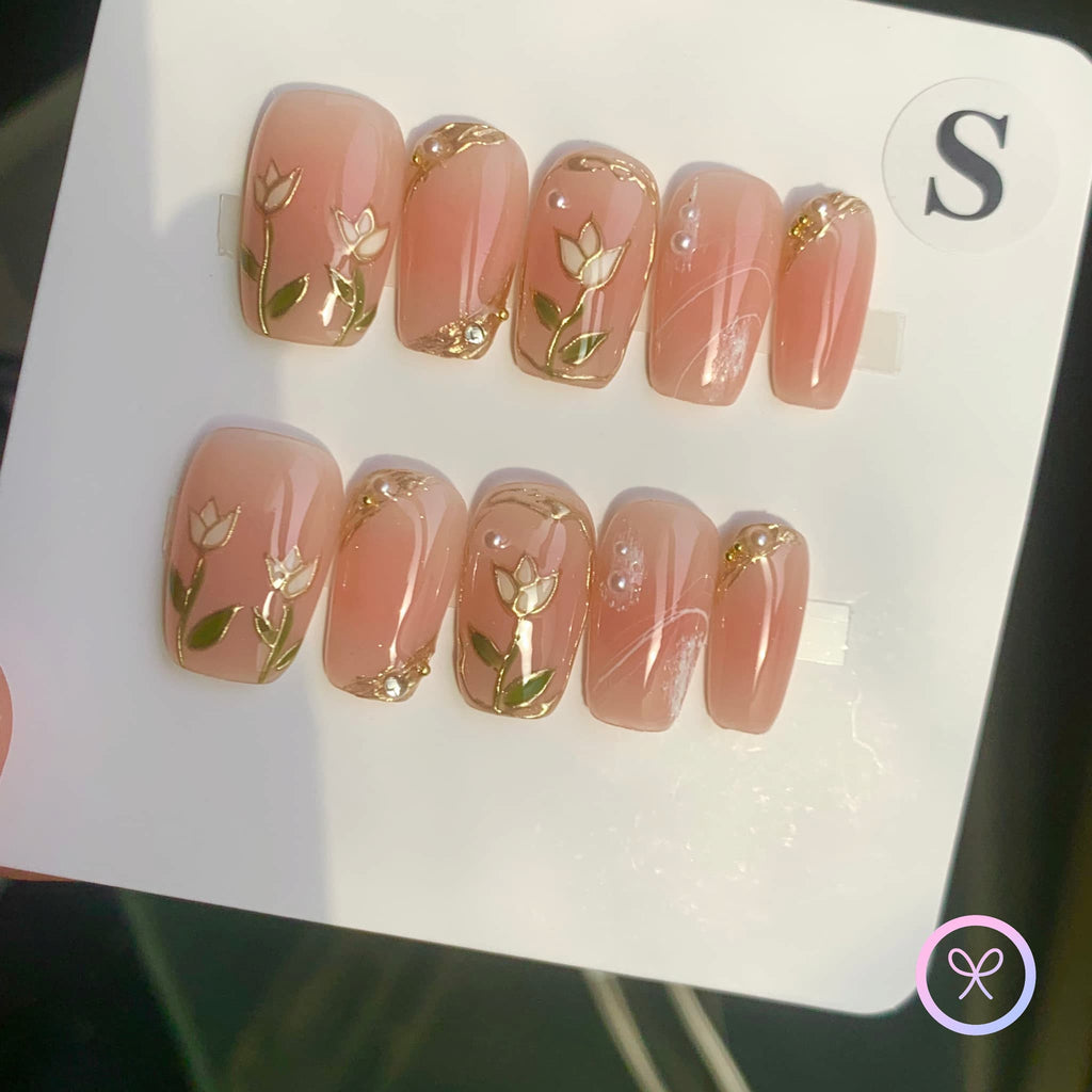 romantic nude glossy medium square press on nails with embossed flowers and gilded element