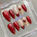 romantic red glossy medium almond press on nails with rose and gold contour