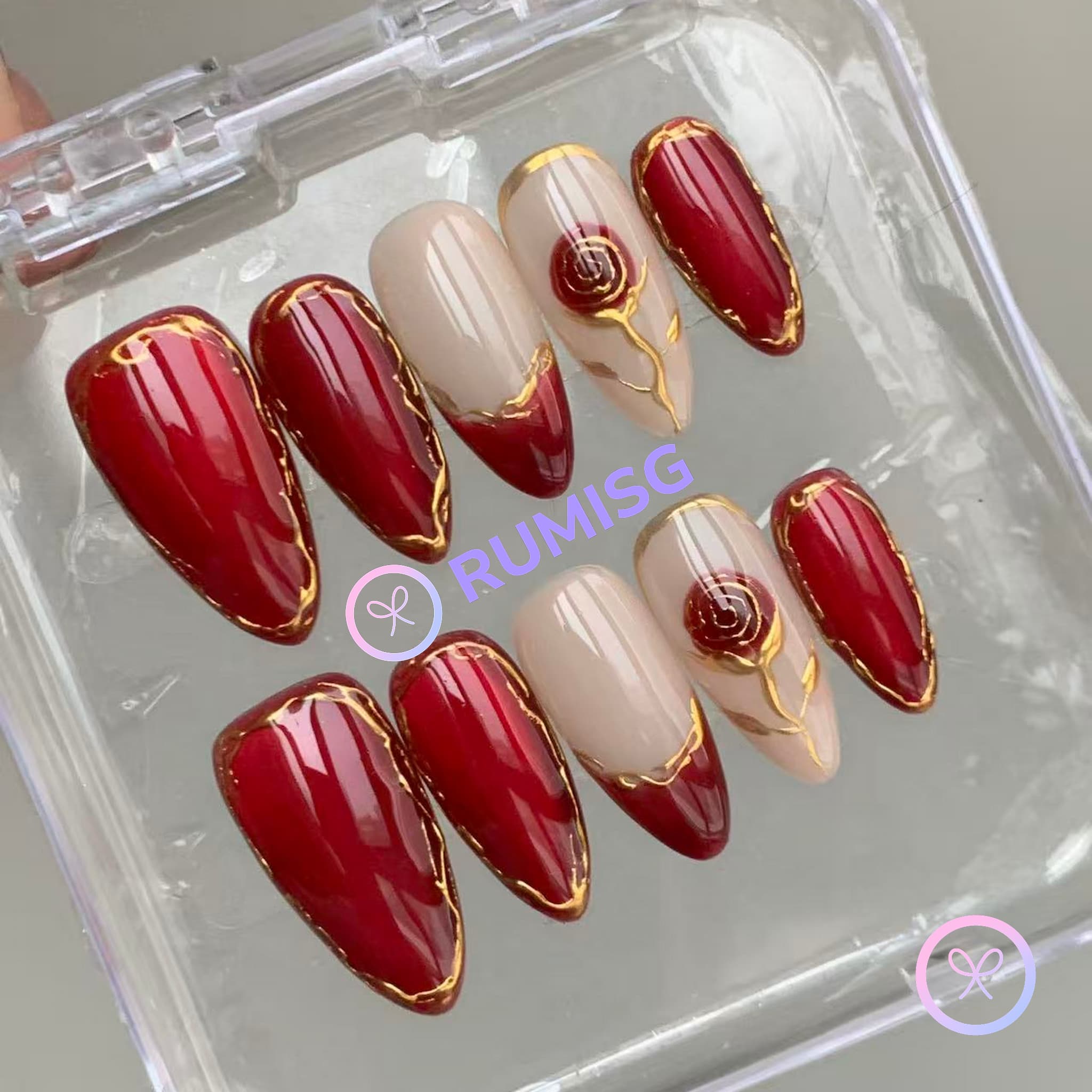 romantic red glossy medium almond press on nails with rose and gold contour