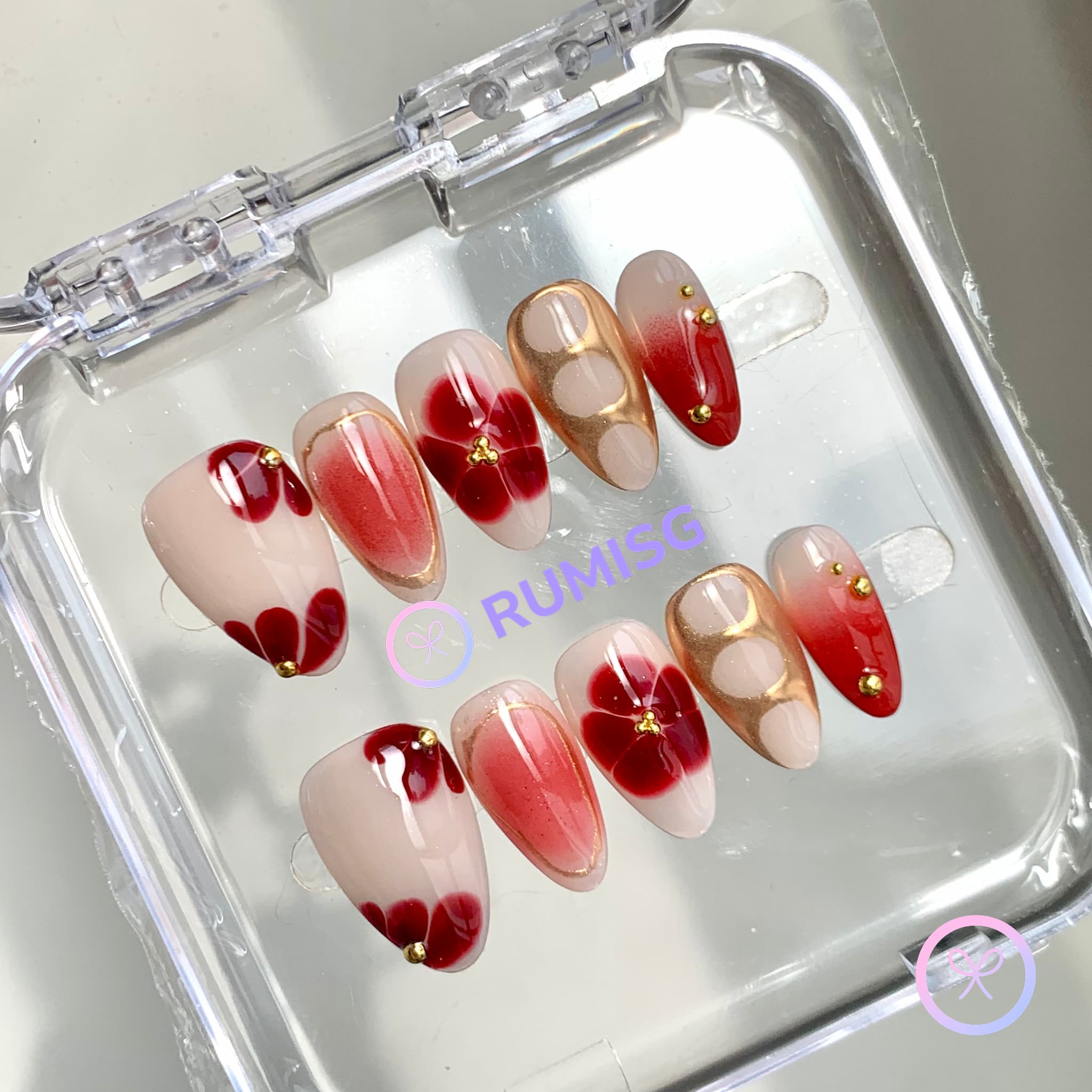 elegant red glossy short almond press on nails with bloom flowers and gold beads