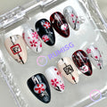 sakura black glossy short almond press on nails with sakura blossoms and ink branches