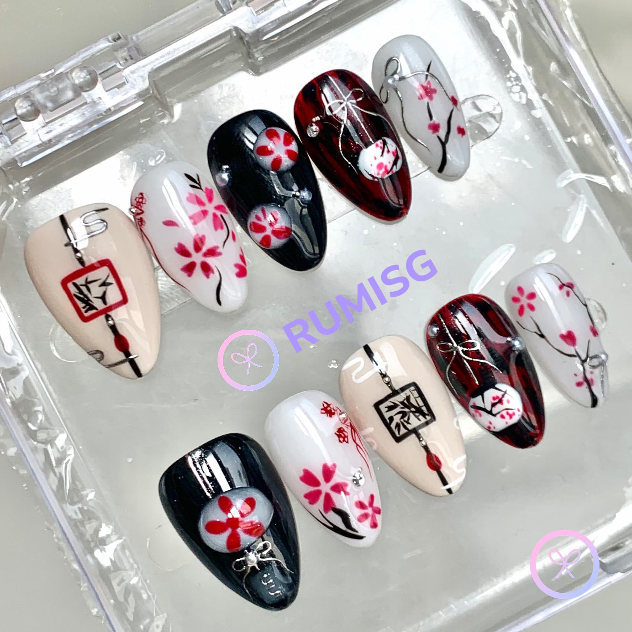 sakura black glossy short almond press on nails with sakura blossoms and ink branches