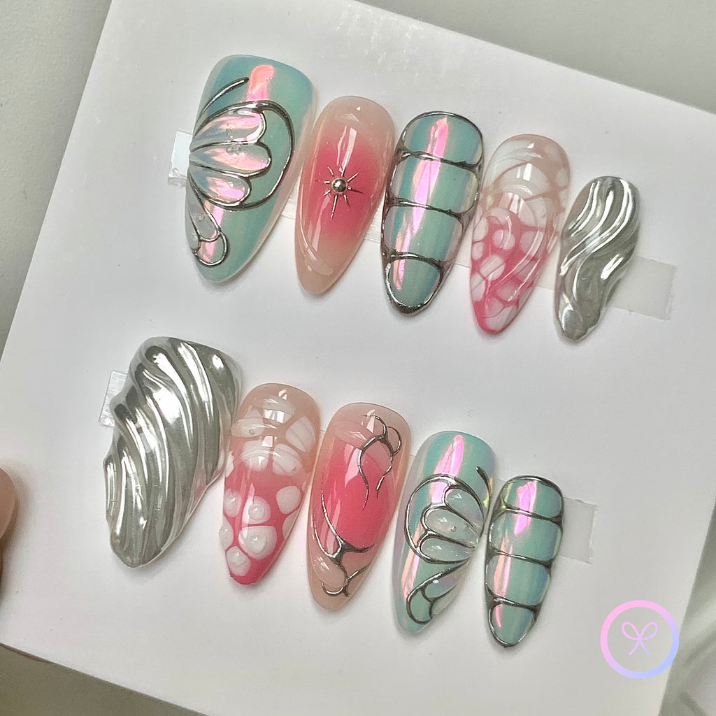 elegant pink iridescent medium almond press on nails with butterfly wings and hollow french
